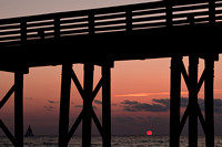 Sunset through a Pier